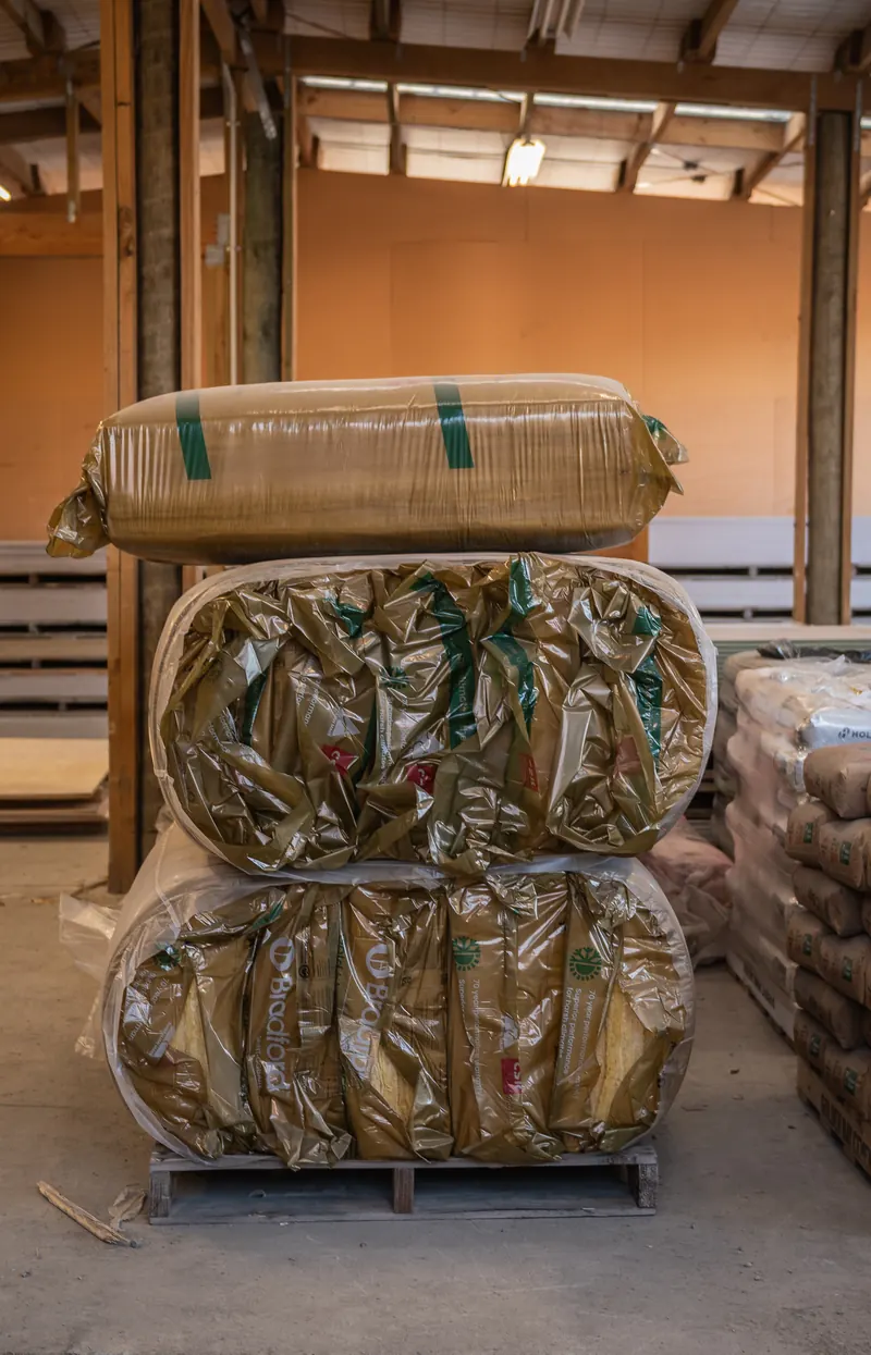 Bales of insulation stored under cover at BuildLink Timaru