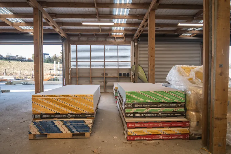 Packs of plasterboard on pallets in a BuildLink Timaru bay