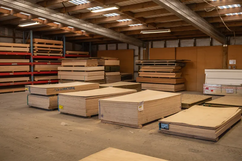 Sheets of panel product stacked flat inside the BuildLink Timaru warehouse