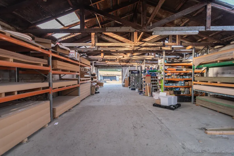 Racked timber running the length of the BuildLink Timaru store